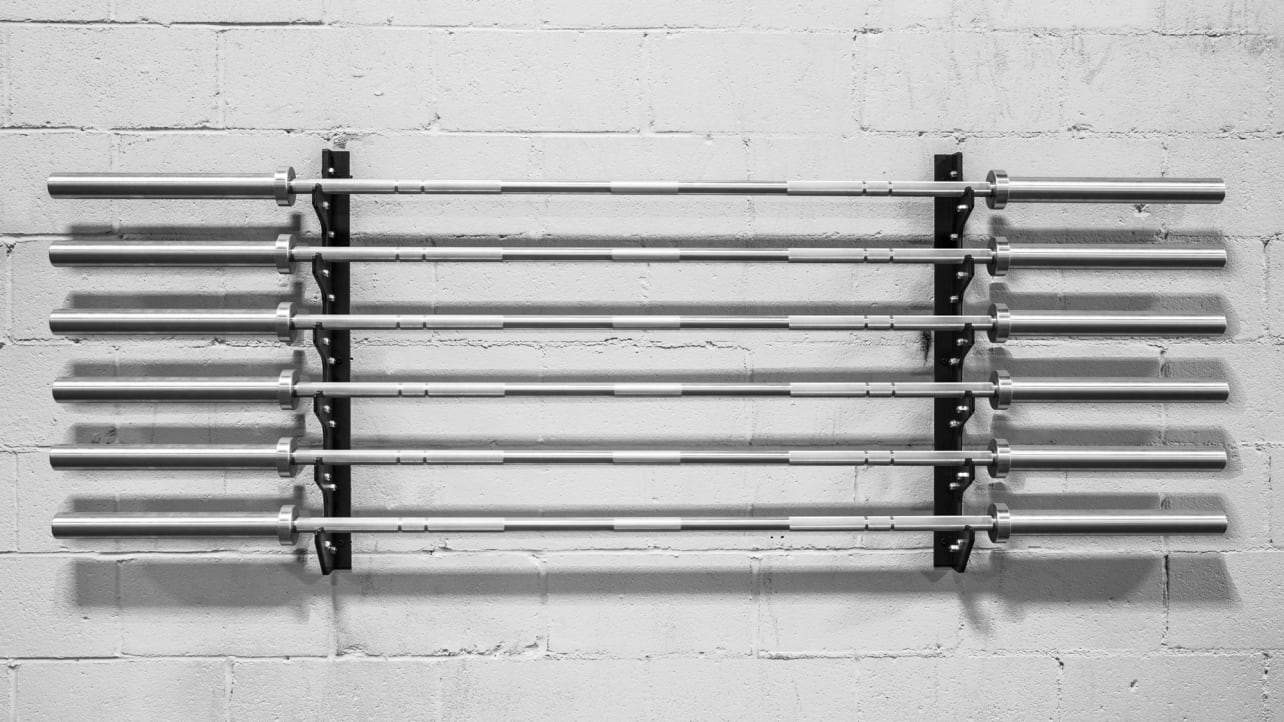 Tired of tripping over your barbells? Discover how the Rogue Gun Rack can transform your cluttered gym into an organized haven. With standout features that protect your investment and simple installation, this gym essential promises to enhance your workout experience. Click to unveil the upgrade your fitness space desperately needs!
